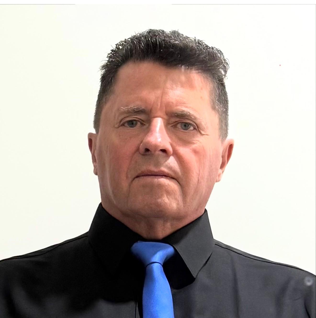 Neil B Gibson